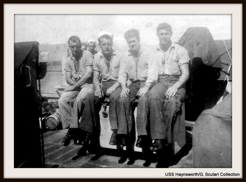 Kenneth Ferris GM2c second from left in group of 4